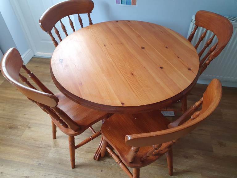Round pine dining table with 4 chairs