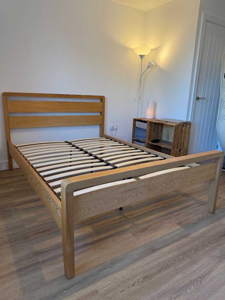 Double mattress sized wooden bed frame