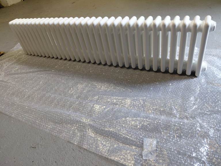 2x brand new Ultraheat 3-column white radiators for sale