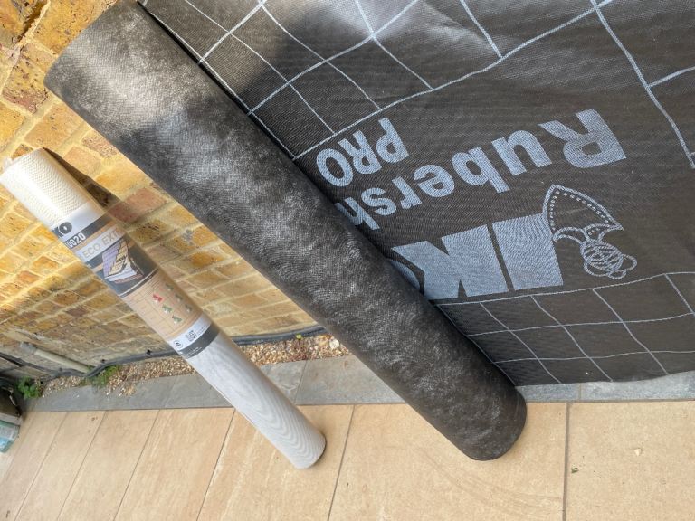 2 rolls of roofing materials