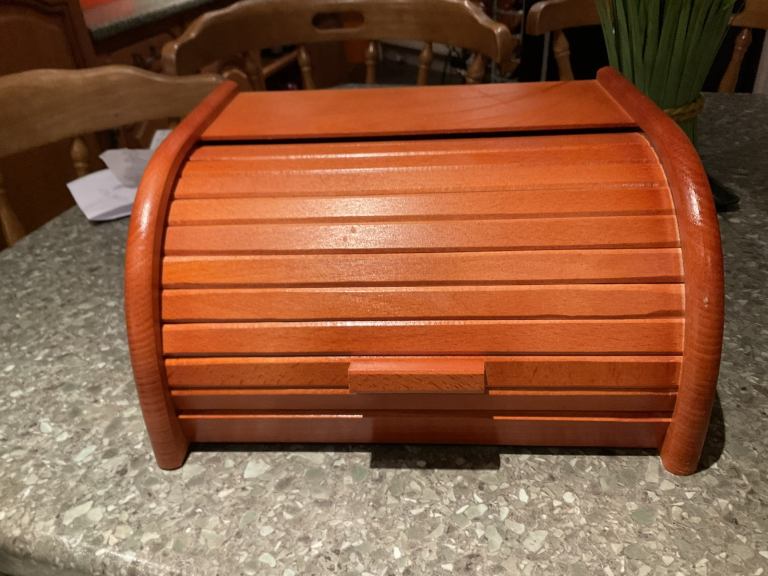Orange roll top bread bin 