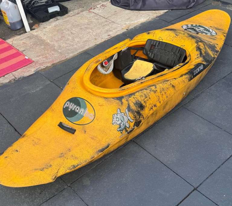 Pyranha Fusion 225 Kayak with Paddle, Wetsuit, and Buoyancy Aid