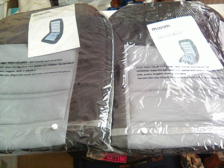 Pair Maxim 12 volt heated car seat covers.