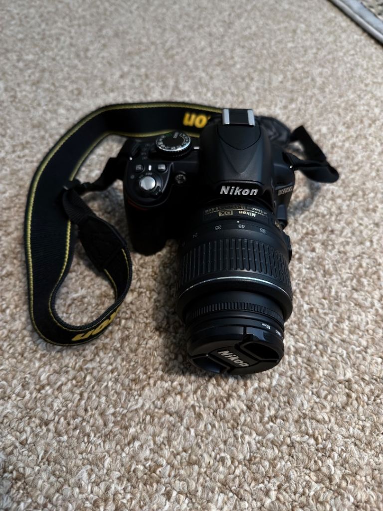 Nikon D3100 DSLR camera and 18-55mm zoom lens