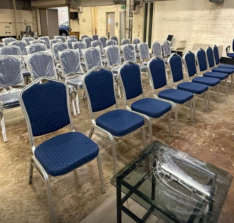 Brand new 200 solid stackable banqueting chairs 