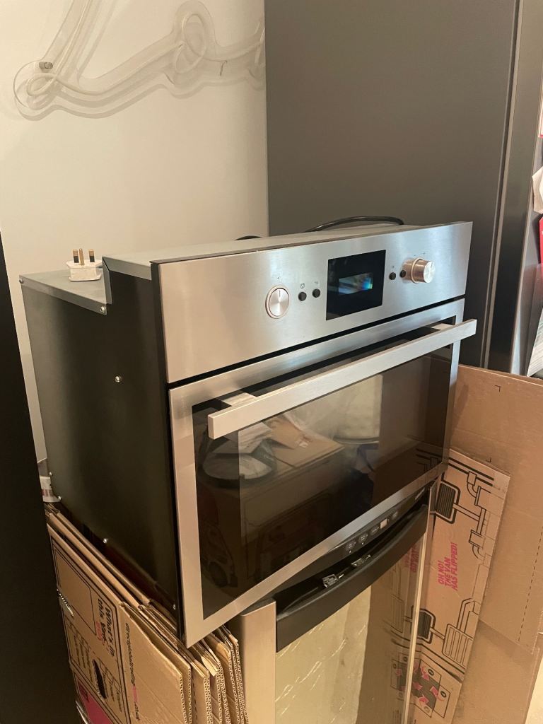 Integrated/Built in IKEA RAFFINERAD MWP R00 fab microwave and oven (no glass turning plate)