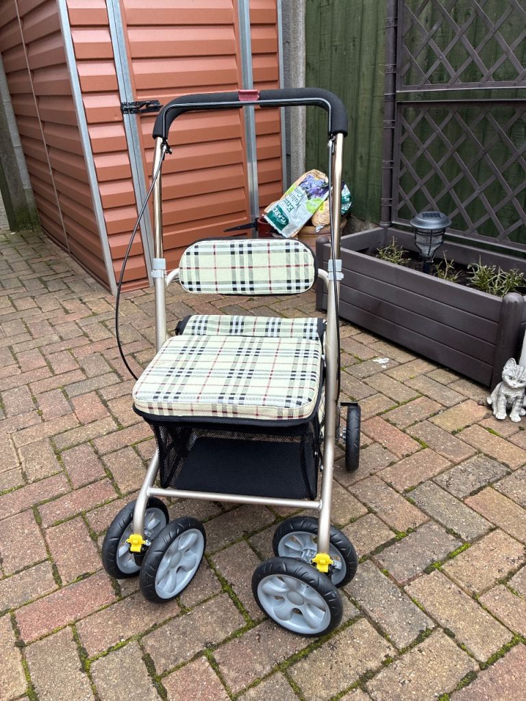 Mobility Walker with Seat and Storage Bag – Good Condition