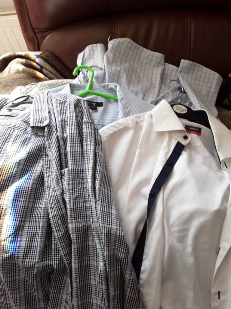 A quantity of mens shirts m/L £2 each 