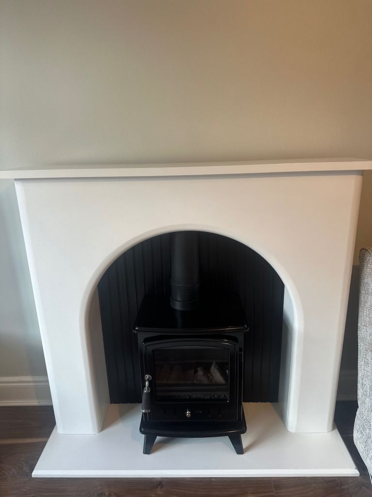 Black Wood Burner (electric) with Fireplace Surround – Good Condition