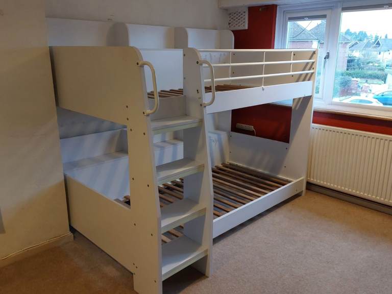 Lovely bunk beds for children. Sturdy, attractive, integrated shelves