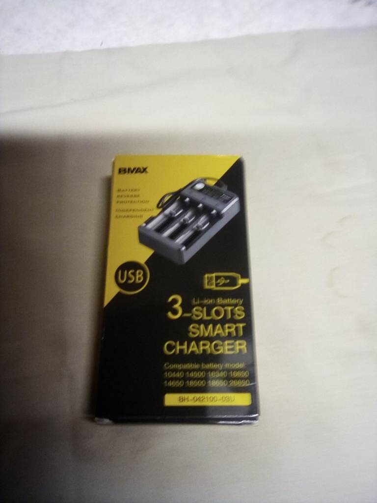 18650 battery charger and two new batteries 