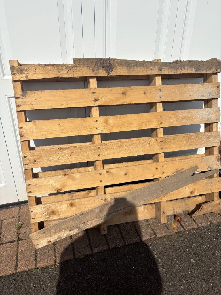 Used Wooden Pallet and  New Brown Guttering - Good Condition