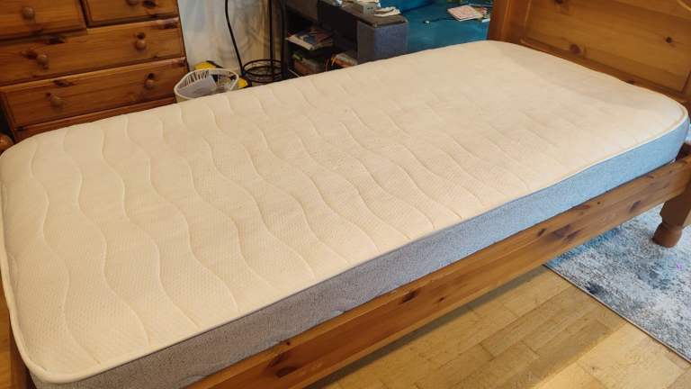 Pine single bed with 6 month old mattress.