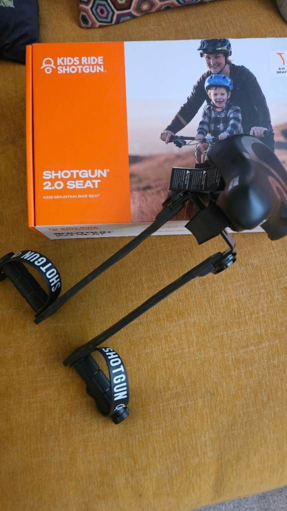 Kids ride shot gun front bike seat