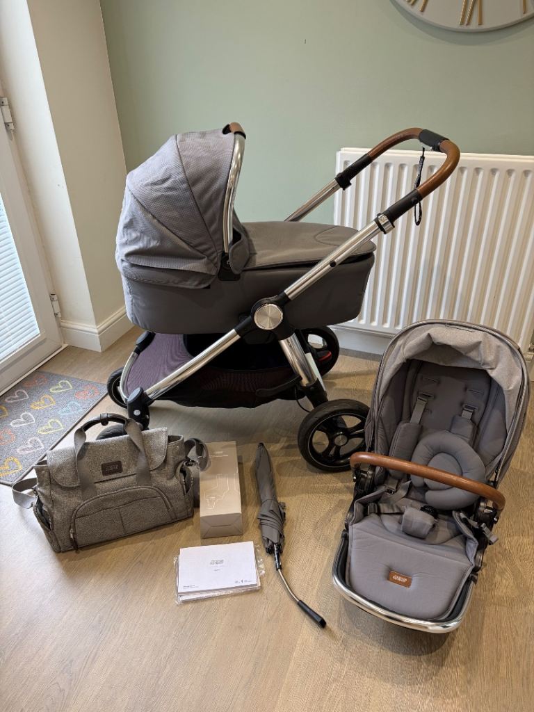 Stylish Grey Travel System with Pram, Pushchair, and Accessories