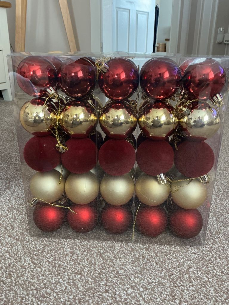 Brand new in box, 50 x red and gold tree baubles. 2xboxes for £15.