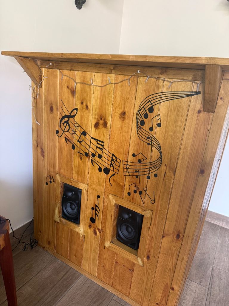 Wooden Home Bar with Speakers and Music Note Decor