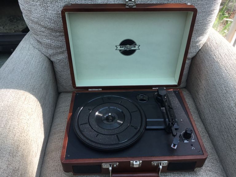 Brand new. Retro Club Portable Record Player - Brown Wood Finish.