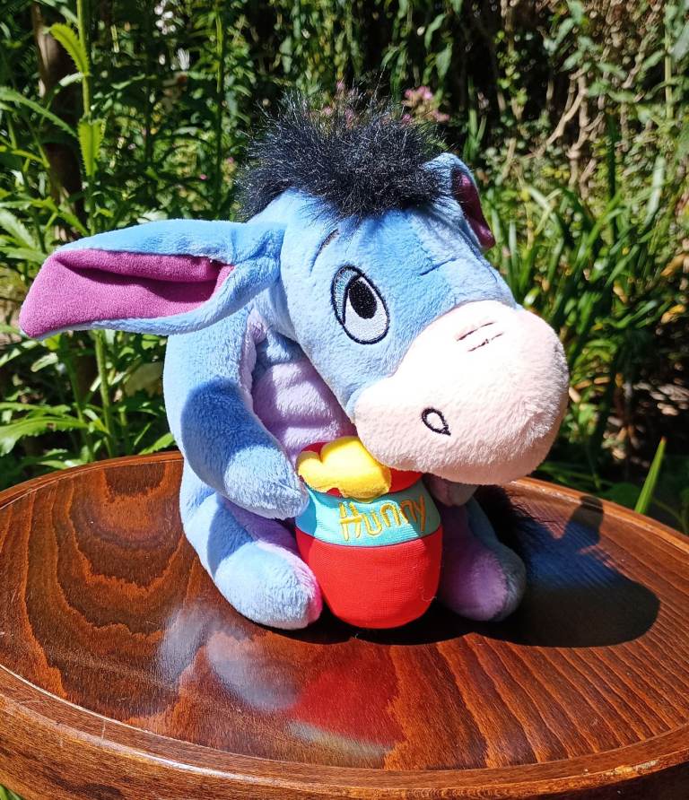 Eeyore plush with honey pot