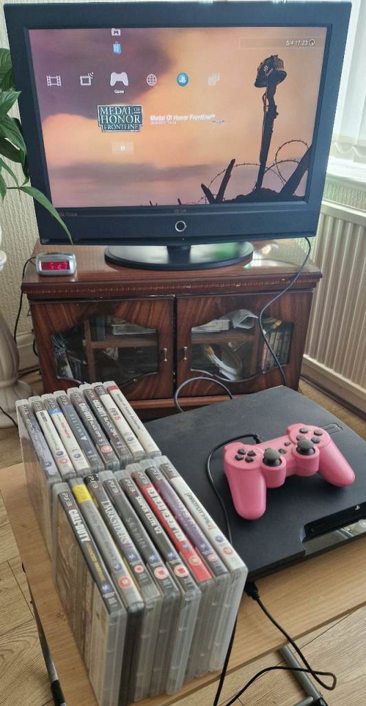 Sony PlayStation 3 + Games