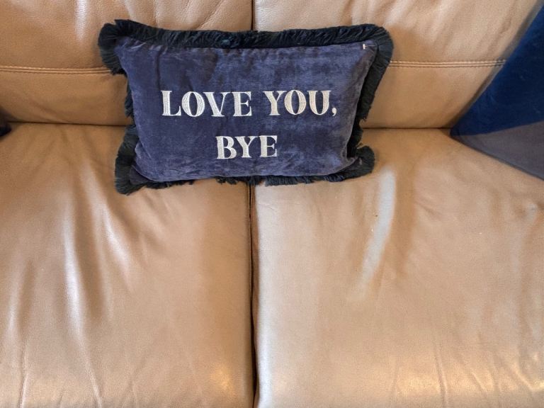 Harvey’s Grey Leather settee