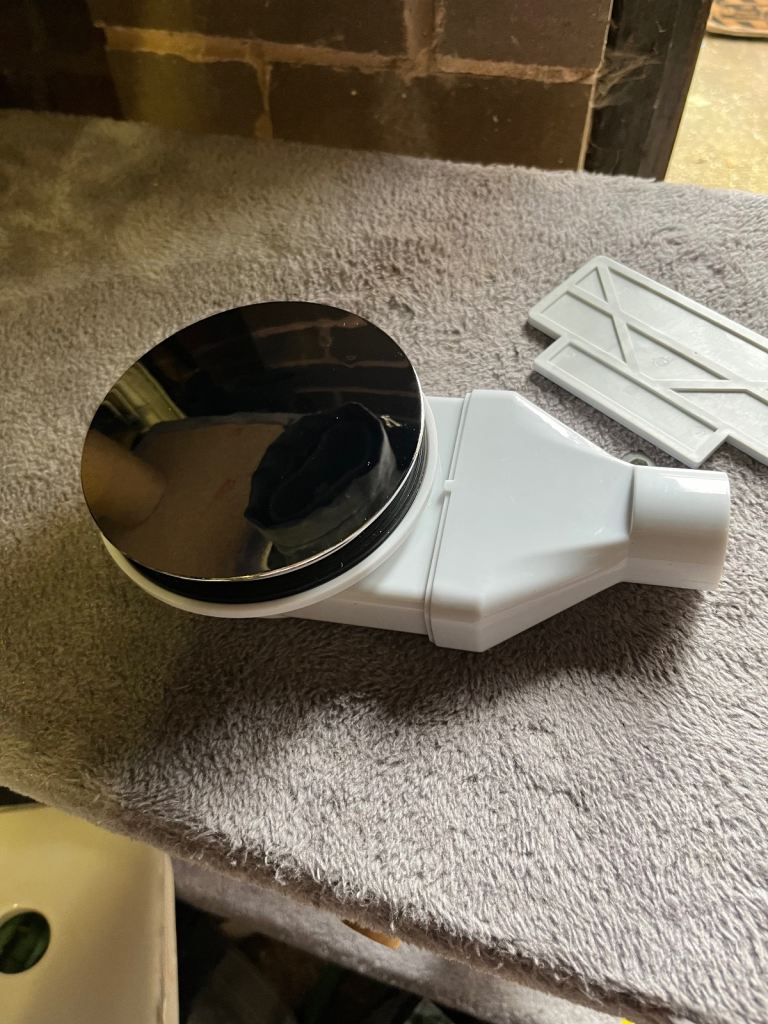 Chrome slimline shower tray trap