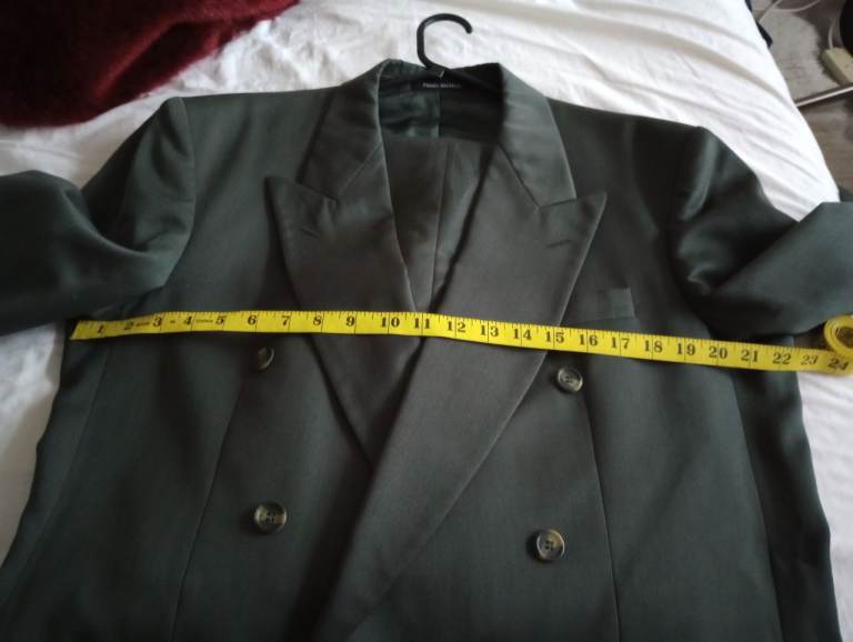 Pierre Balmain green suit.