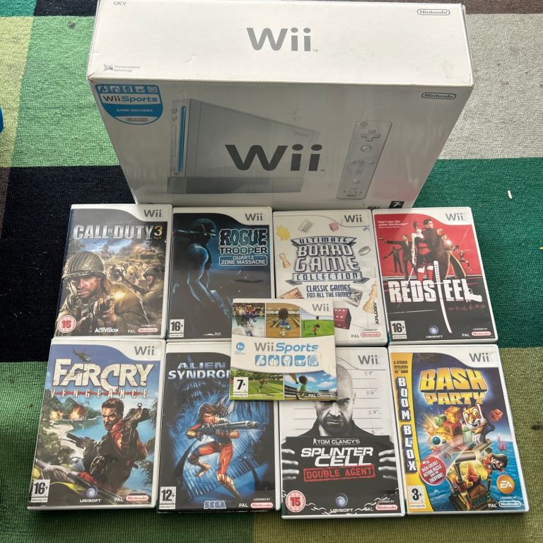 Nintendo Wii boxed with Wii sports & 8 games 