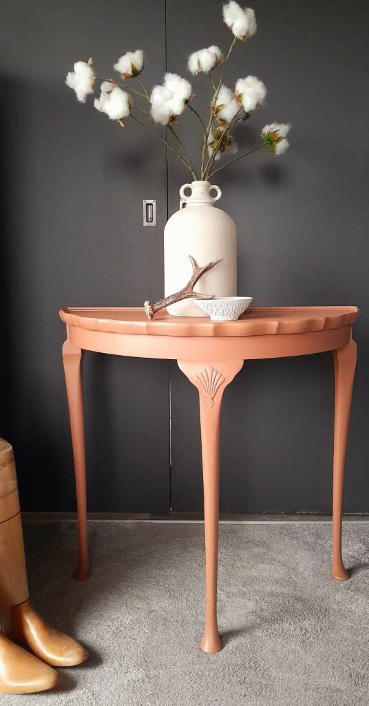 Ornate half moon console table