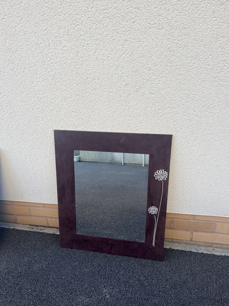 Mirror with suede frame