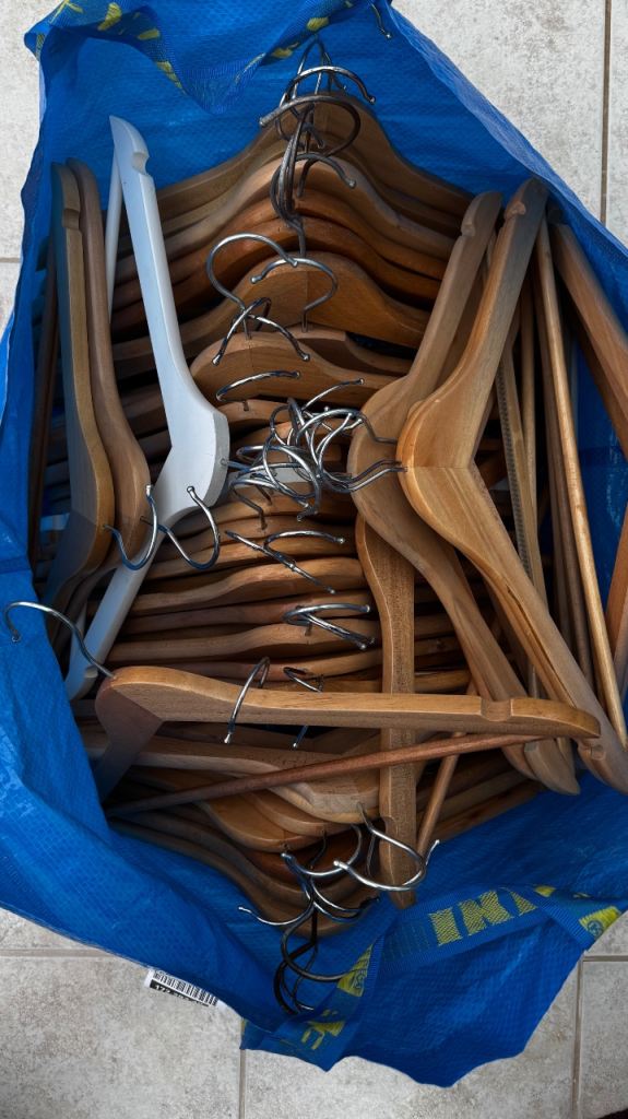 Large bag of wooden hangers 