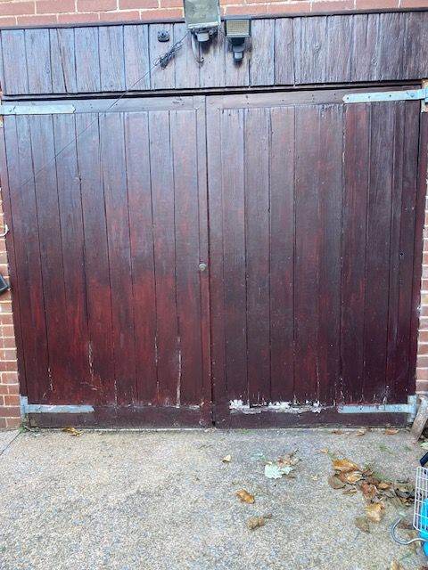 Wooden Garage Doors – Fair Condition, Ready for Renovation