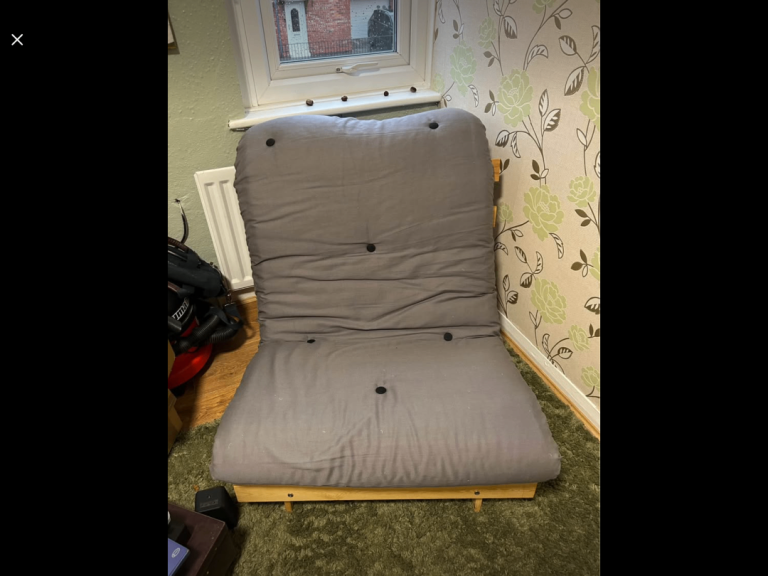 Single grey futon.