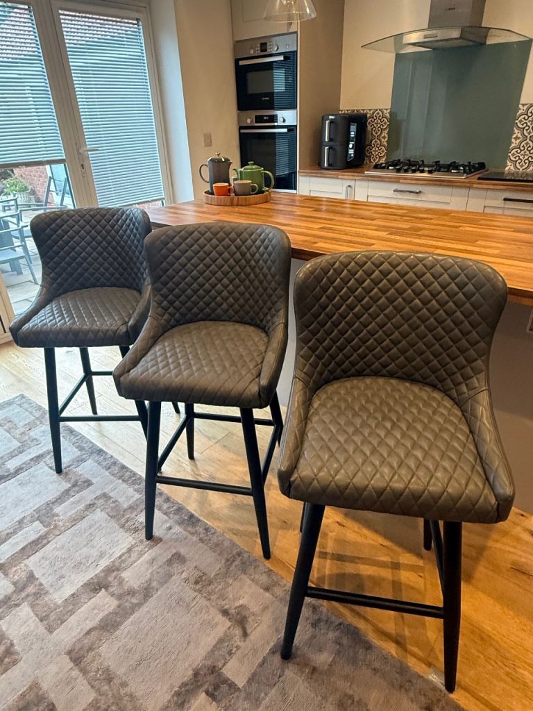 Grey leather bar stools £50 each virtually new condition 