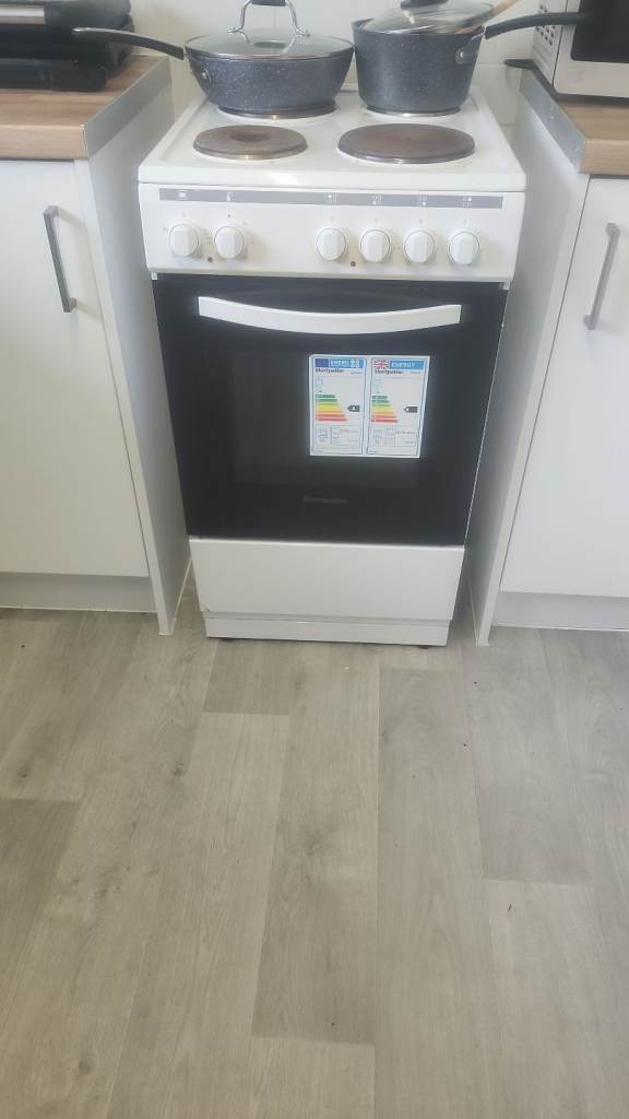 White Freestanding Electric Cooker with Hob and Oven