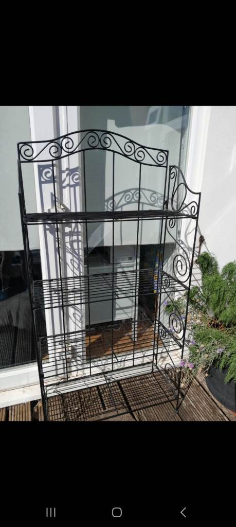 Wrought iron shelving unit