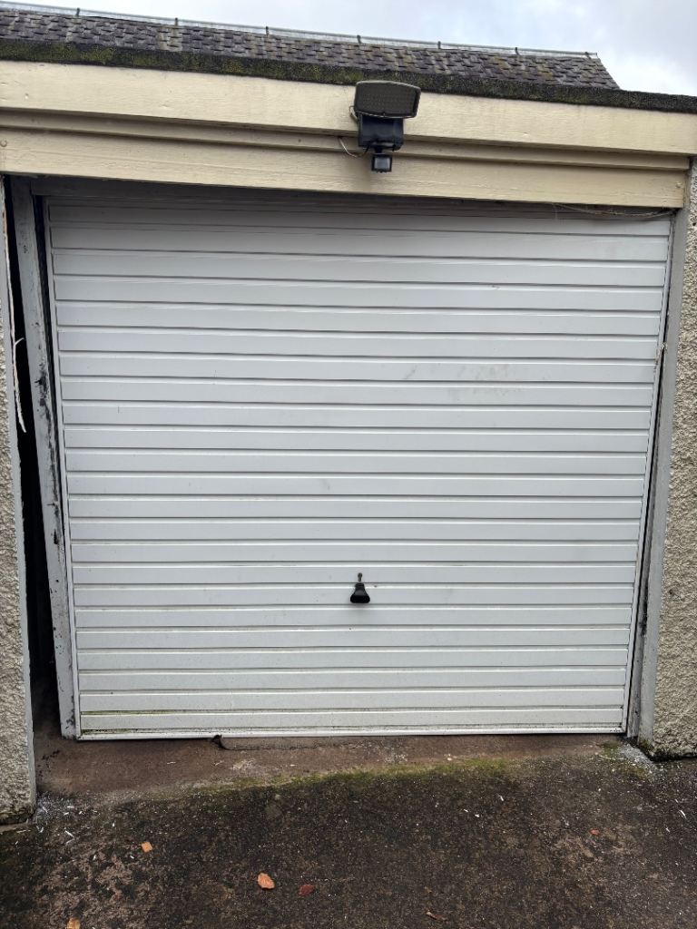 Prefab garage. Dismantled ready to go. Garage door nearly new. With keys. 