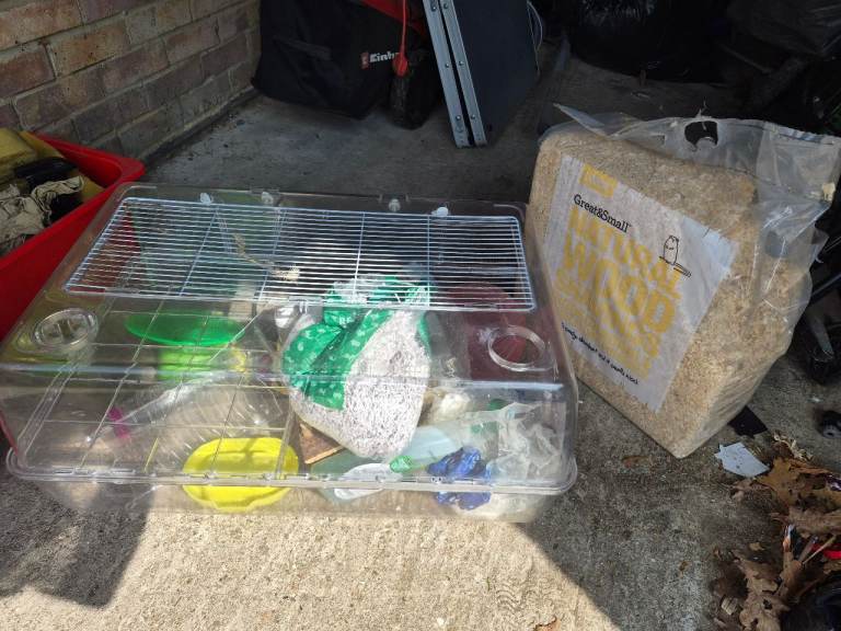 Hampster cage, sawdust and cleaning equipment