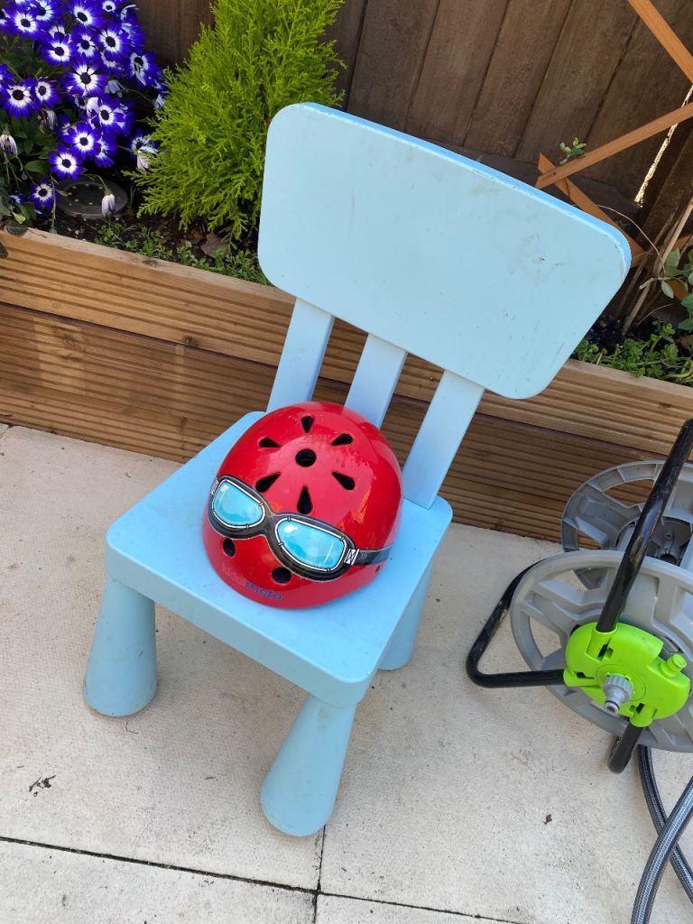 kids ikea chair and helmet 