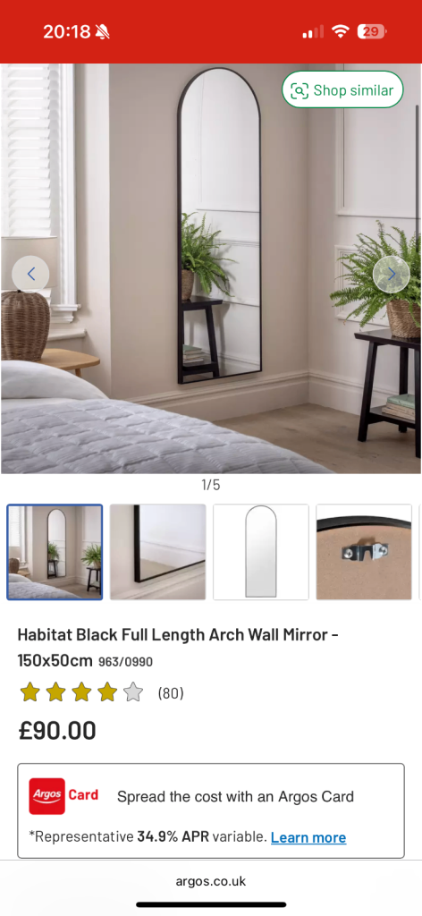Black habitat arch mirror 