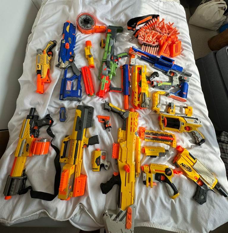 Collection of Nerf Guns and Bullets 