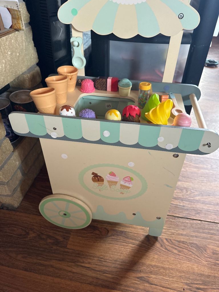 Toy ice cream cart with extras