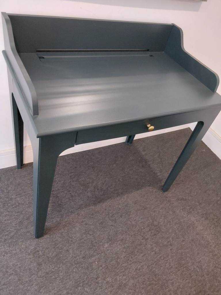 Table for laptop entrance or mini bar.