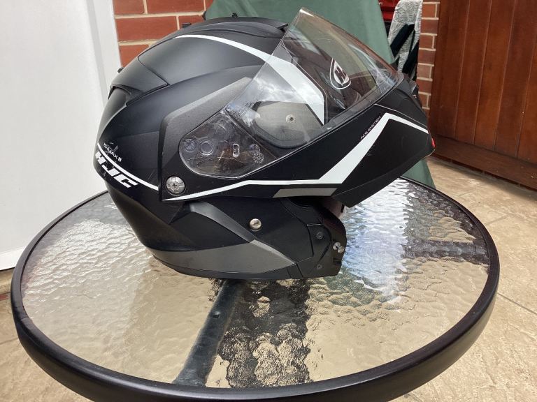 Crash helmet and 2 pair of gloves 