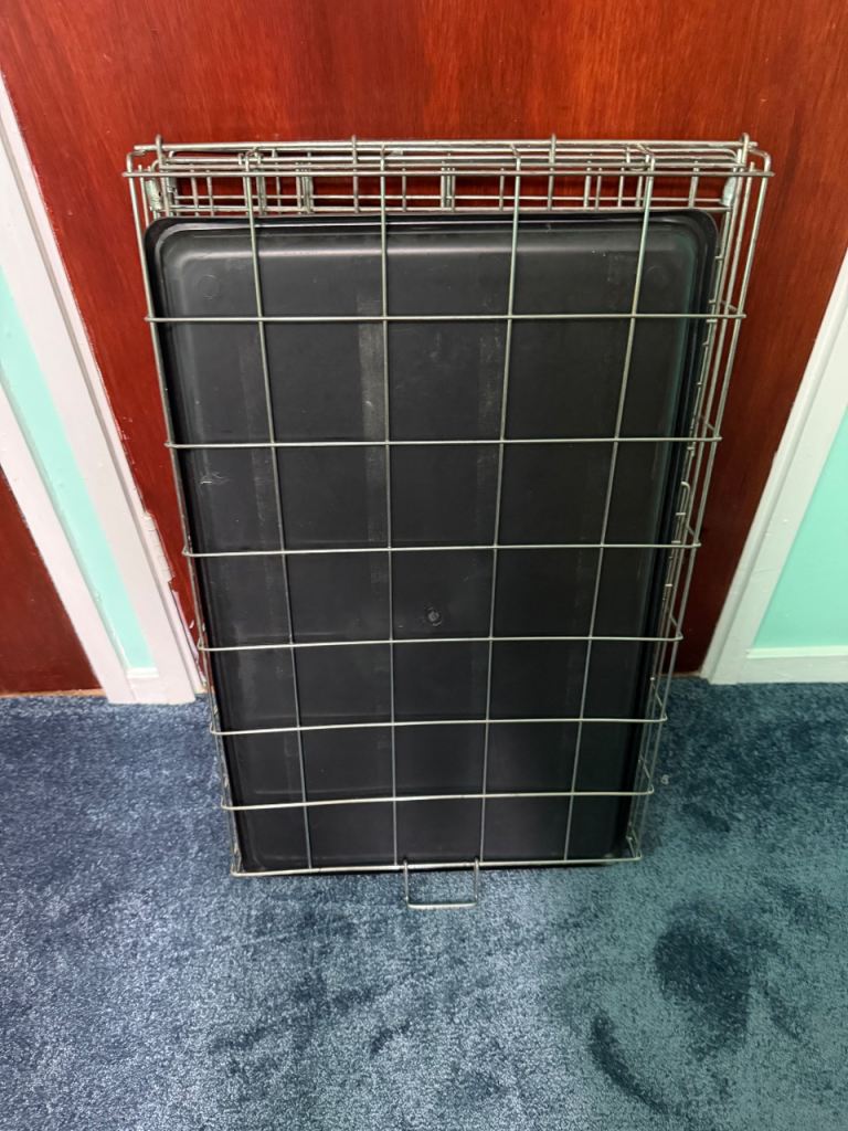 Dog crate with tray and carry handle