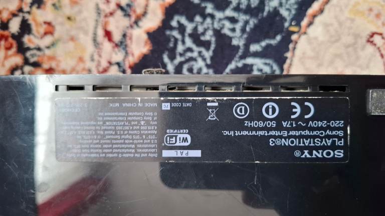 Sony PS3 with 1 extra controller and games