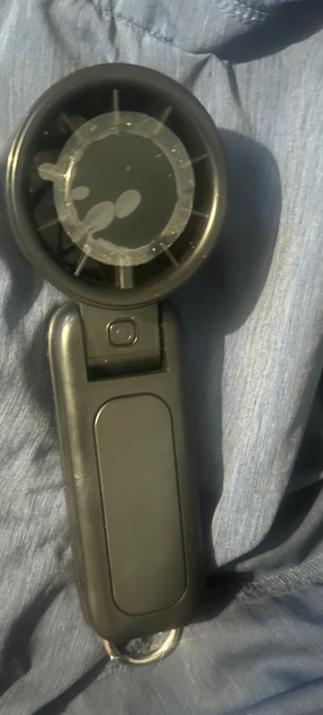Hand held fan. 