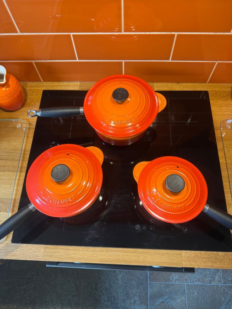 Le Creuset set of 3 pans in volcanic orange sizes 16 18 and 20