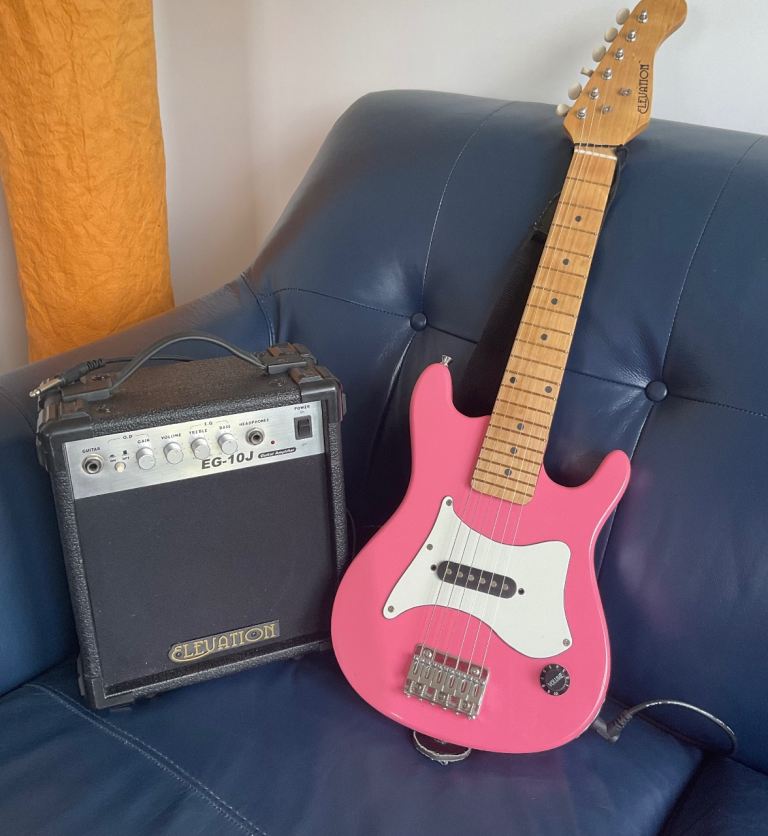 Electric guitar and amp, half size perfect first guitar very good condition.
