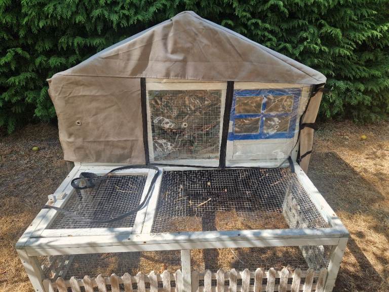 Outdoor hutch raincover
